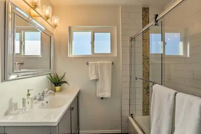 a bathroom with a sink and a shower at Oceanside Home with Patio and Grill, Walk to Beach! in Oceanside