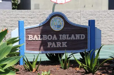 a sign for the balboa island park at 128 Agate in Newport Beach