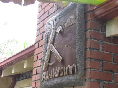 a sign on the side of a brick building at Always Inn San Clemente Bed & Breakfast by Elevate Rooms in San Clemente