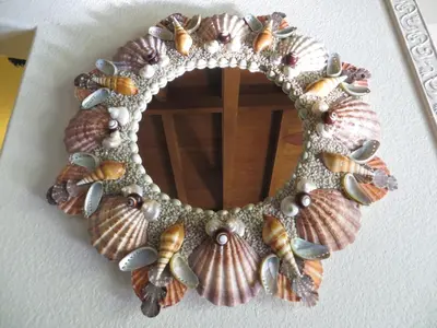 a seashell and pearl necklace on a wall at Always Inn San Clemente Bed & Breakfast by Elevate Rooms in San Clemente