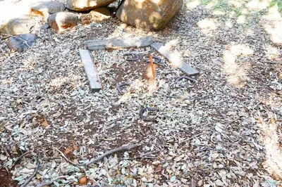 a pile of rocks and debris on the ground at Pine Hills Cabin in Julian in Julian