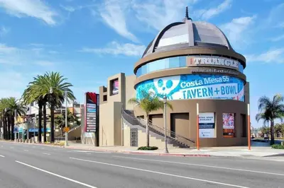 a building on the side of a street at 1000#4 Modern Beach Home, Steps from Sand w/AC! in Newport Beach