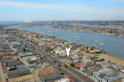 an aerial view of a city with a harbor at 1000#4 Modern Beach Home, Steps from Sand w/AC! in Newport Beach
