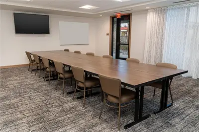 a large conference room with a large table and chairs at Staybridge Suites - Temecula - Wine Country by IHG in Temecula