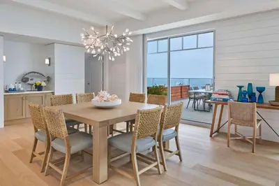 a kitchen and dining room with a table and chairs at The Seabird Ocean Resort & Spa, Part of Destination Hotel by Hyatt in Oceanside