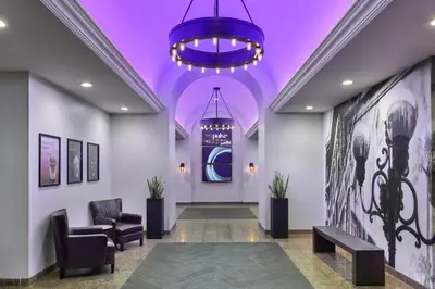 a lobby with a purple ceiling and chairs and a waiting room at Marriott Vacation Club®, San Diego    in San Diego