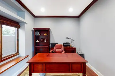 an office with a desk and a chair in a room at Sycamore Beach Retreat in Carlsbad