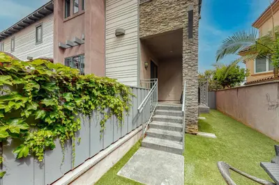 a stairway leading to a house with plants at 329 Oak Ave in Carlsbad