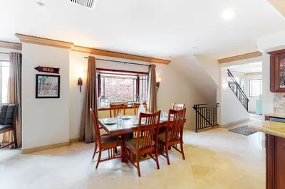 a kitchen and dining room with a table and chairs at 329 Oak Ave in Carlsbad