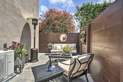 a patio with a table and chairs and a fence at Dog-Friendly San Diego Home - 1 Mi to Ocean Beach in San Diego