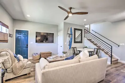 a living room with two couches and a ceiling fan at Dog-Friendly San Diego Home - 1 Mi to Ocean Beach in San Diego