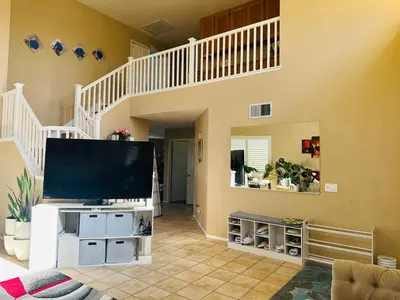 a living room with a large flat screen tv at Balloons and Wine in Murrieta