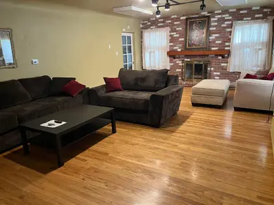 a living room with a couch and a table at Secluded, Charming and Unique! Spacious Apartment EXCELLENT Central Location in San Diego