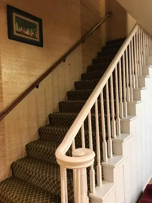 a staircase in a house with a stool in it at Secluded, Charming and Unique! Spacious Apartment EXCELLENT Central Location in San Diego