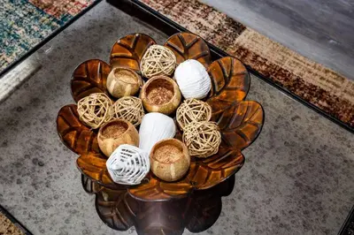 a table topped with a bowl of different types of bread at Cali King Size One Bedroom Luxurious Suite in DTSD in San Diego
