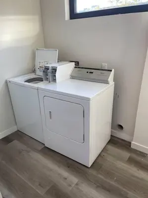 a white washer and dryer in a room at Cali King Size One Bedroom Luxurious Suite in DTSD in San Diego