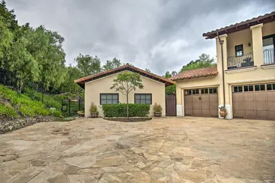 a house with a driveway and a garage at Rancho Santa Fe Casita - Gate Guarded Community! in Rancho Santa Fe