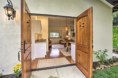 an open door leading to a kitchen and dining room at Rancho Santa Fe Casita - Gate Guarded Community! in Rancho Santa Fe