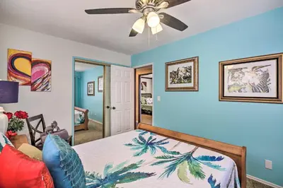 a bedroom with a bed and a ceiling fan at Colorful El Cajon Gem Deck, Garden and Valley Views in El Cajon