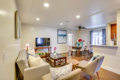 a living room with a couch and chairs and a table at Modern Duplex Near Gaylord Resort and Bayfront! in Chula Vista