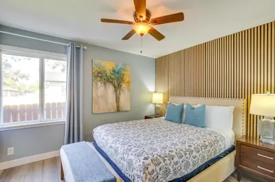 a bedroom with a bed and a ceiling fan at Modern Duplex Near Gaylord Resort and Bayfront! in Chula Vista