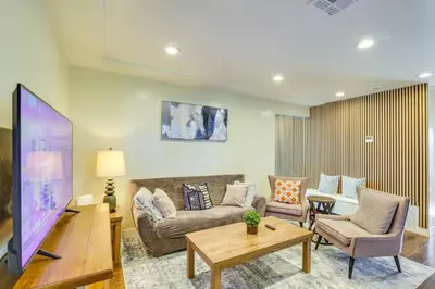 a living room with a couch and a tv at 1 Mi to Gaylord Resort and Bayfront Updated Duplex in Chula Vista