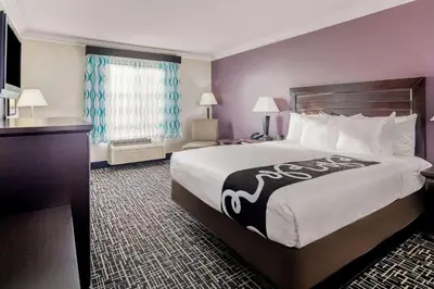 a hotel room with a large bed and a window at La Quinta by Wyndham Temecula in Temecula