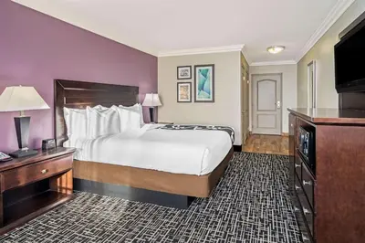 a hotel room with a bed and a television at La Quinta by Wyndham Temecula in Temecula