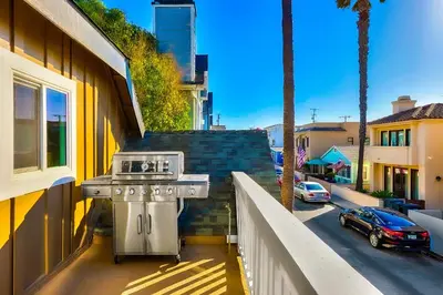 a kitchen sink on the side of a building at Great Balboa Peninsula Combo in Newport Beach