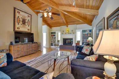 a living room with a couch and a table at Borrego Springs Getaway with Private Pool and Views! in Borrego Springs