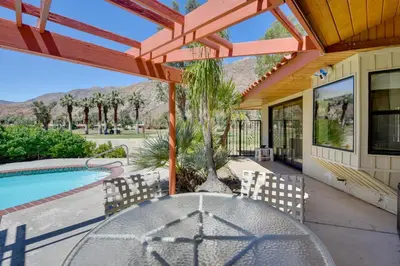 a patio with a table and chairs and a pool at Borrego Springs Getaway with Private Pool and Views! in Borrego Springs