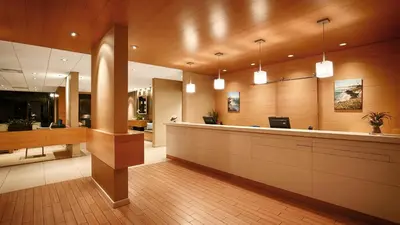 an office lobby with a reception counter and a desk at Inn by the Sea, La Jolla in San Diego