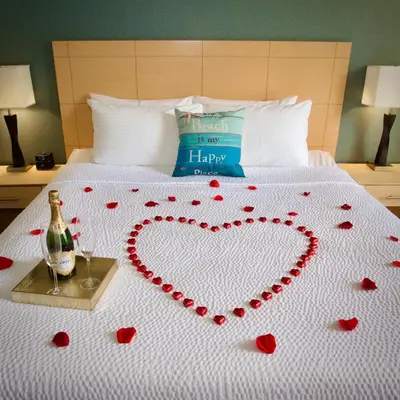 a bed with a heart made out of red hearts at Inn by the Sea, La Jolla in San Diego