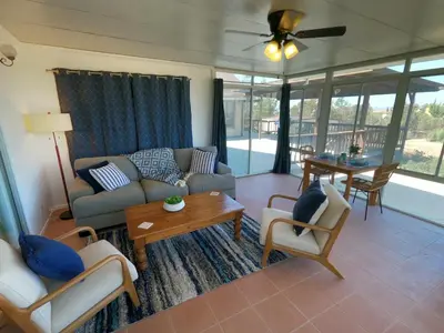 a living room with a couch and chairs and a table at Sommer Hus-Best value in Southern California Wine Country in Temecula