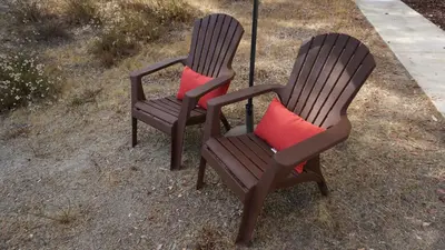 two chairs with red cushions sitting next to each other at Sommer Hus-Best value in Southern California Wine Country in Temecula