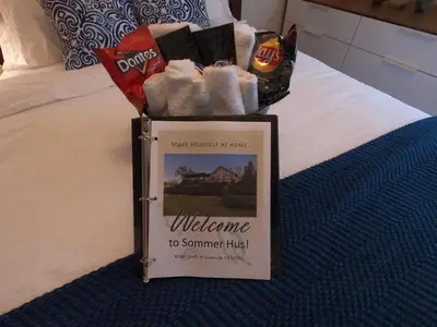 a sign on a bed with a welcome to summer trust at Sommer Hus-Best value in Southern California Wine Country in Temecula
