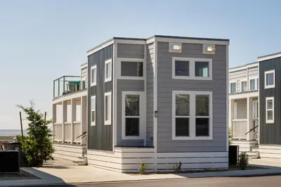 a row of houses on the side of a street at Sun Outdoors San Diego Bay in Chula Vista