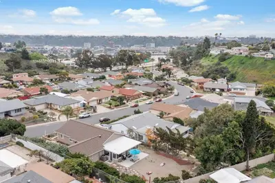 an aerial view of a small town with houses at 4 BR Home with Game Room! Family Friendly! Centrally Located! in San Diego