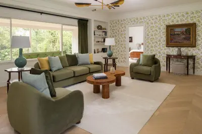 a living room with a couch and chairs and a table at The Inn at Rancho Santa Fe in Rancho Santa Fe