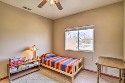 a bedroom with a bed and a window at Borrego Springs Stargazing Home with Mtn Views in Borrego Springs