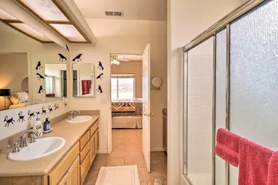 a bathroom with two sinks and a shower at Borrego Springs Stargazing Home with Mtn Views in Borrego Springs