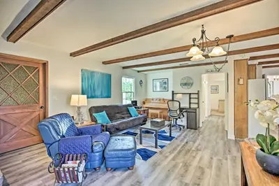 a living room with a couch and a table at Quaint La Mesa Home with Beautiful Sunsets! in La Mesa