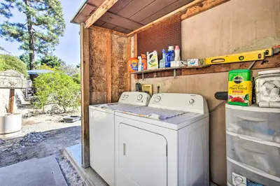 a white washer and dryer in a house at Sunny Bonita Studio about 5 Mi to Historic Dtwn! in Bonita
