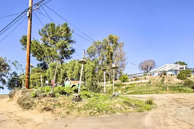 a truck parked on the side of a dirt road at Sunny Bonita Studio about 5 Mi to Historic Dtwn! in Bonita