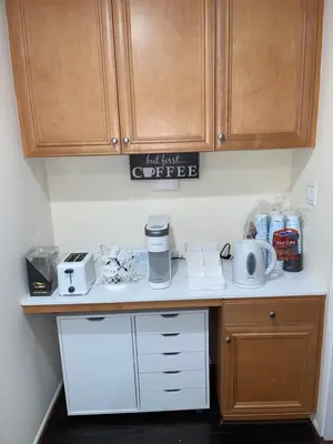 a kitchen counter with a coffee maker on it at Resort like stay in a lovely room near UCI in Irvine