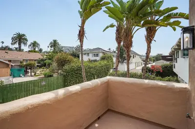 a view from the balcony of a house with palm trees at Draper Oasis Ocean vVews in San Diego