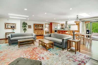 a living room with two couches and a table at Hilcraft Home in Solana Beach