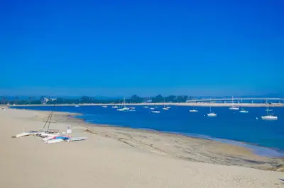 a group of boats sitting on the beach at Cohasset Getaway Unit #3 in San Diego