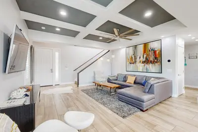 a living room with a couch and a ceiling at Ingraham Delight Pacific Beach in San Diego