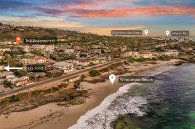 an aerial view of a beach with buildings and the ocean at The Rosemont III - La Jolla Luxury in San Diego
